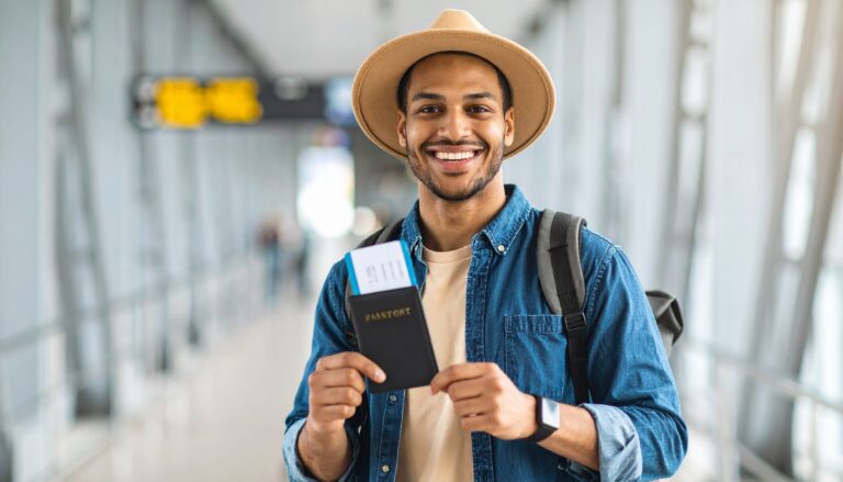 Traveler holding passport and dummy flight ticket for visa application